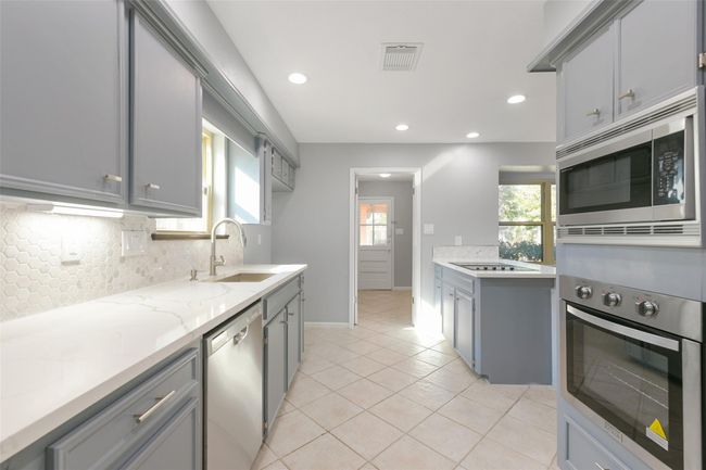 Quartz counters throughout. New appliances! | Image 8