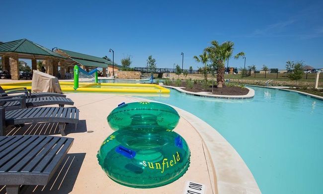 View of swimming pool with a gazebo and a pool with connected hot tub | Image 35