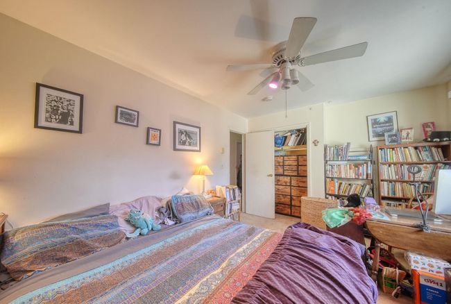 Carpeted bedroom featuring a closet and ceiling fan | Image 14