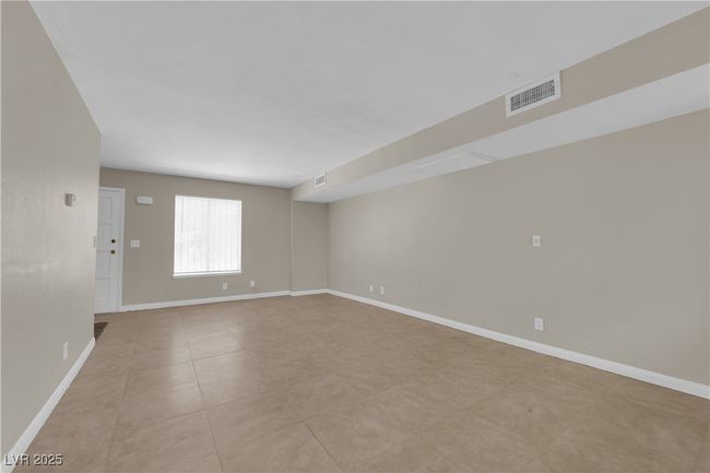 Spare room with baseboards and light tile patterned floors | Image 6