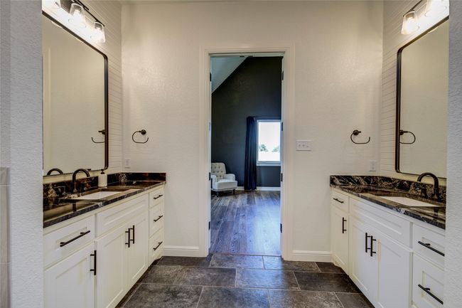 Bathroom with tile flooring and double sink vanity | Image 15