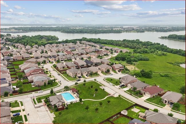 View of property location with a large body of water and nearby suburban area | Image 31