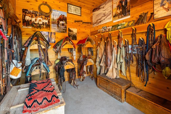 Enhanced Tack Room for your custom saddles, chaps and everything a cowboy needs to get on your trail. | Image 24