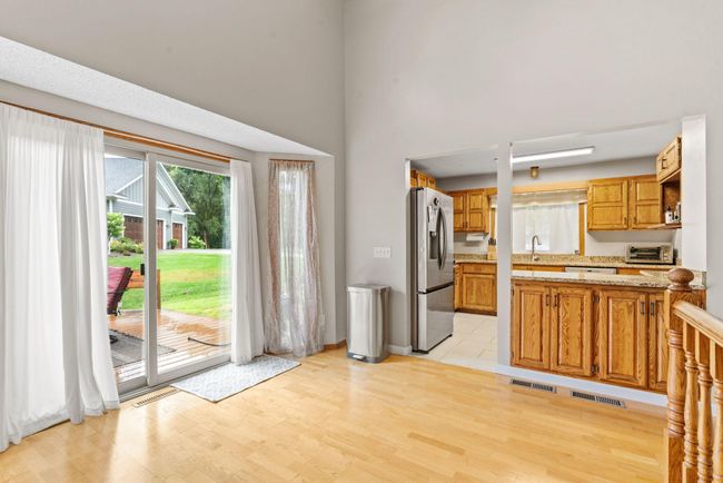 Bright & sunny dining space with easy access to the deck! | Image 8
