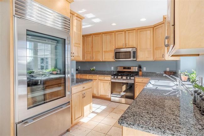 Granite Kitchen with Sub-Zero and Stainless Appliances. | Image 9