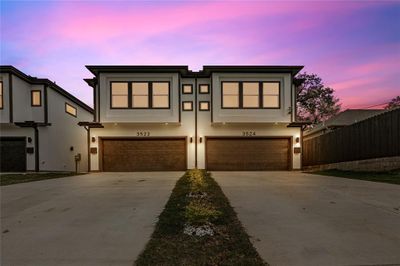 View of front of property featuring a garage | Image 1