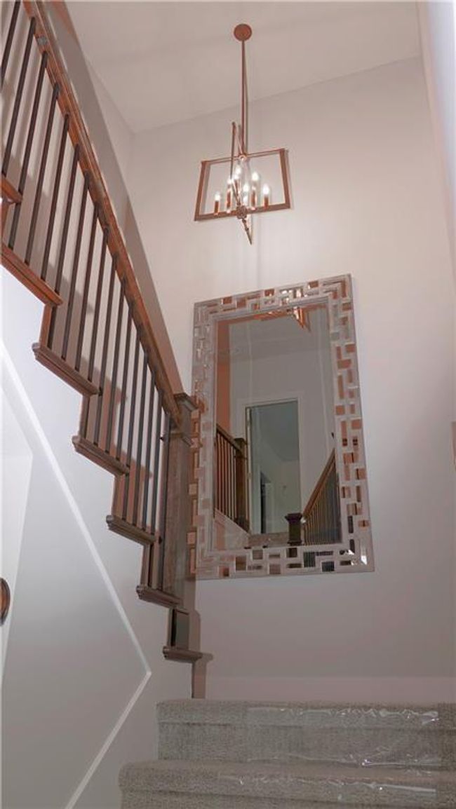 Stairway from the main to the upper level | Image 25