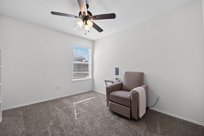 Living area featuring carpet floors and a ceiling fan | Image 14