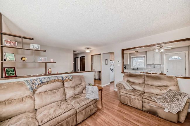 3816 Dover Ridge Drive Se, Home with 3 bedrooms, 1 bathrooms and 2 parking in Calgary AB | Image 4