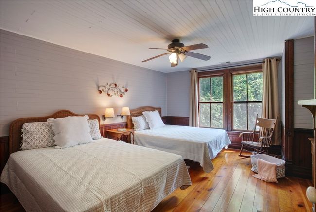 large guest bedroom accommodates 2 queen beds | Image 30