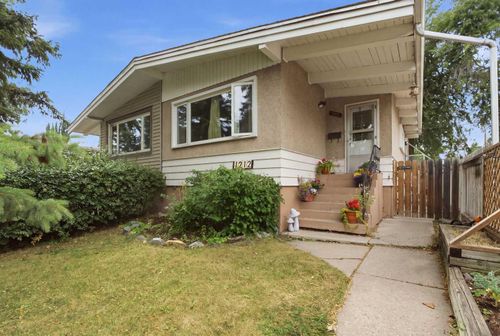 1212 Rosehill Dr Nw, Home with 4 bedrooms, 2 bathrooms and 1 parking in Calgary AB | Card Image