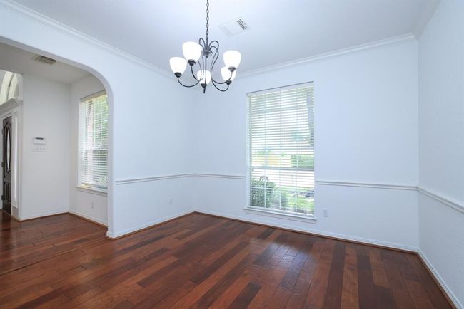 Formal dining offers crown and chair molding. | Image 7