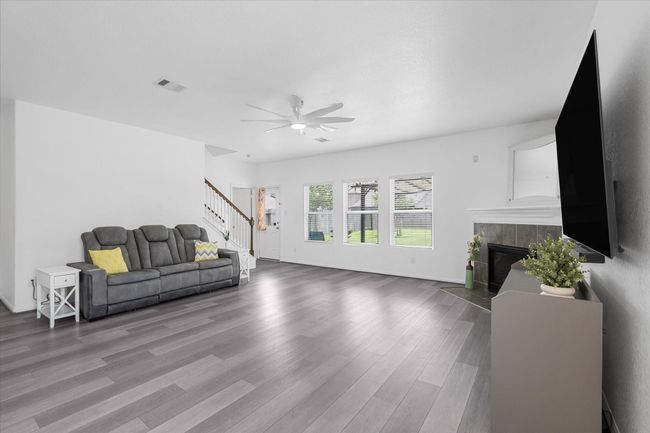 Living room features gas fire place | Image 6