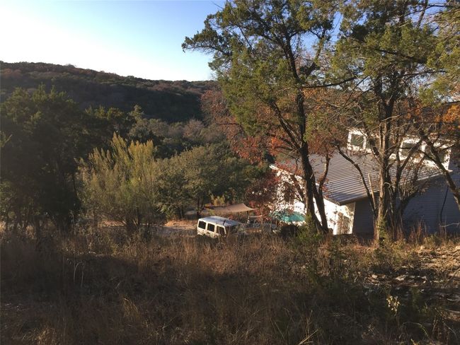 Property westerly view of valley, hills featuring a forest view | Image 26
