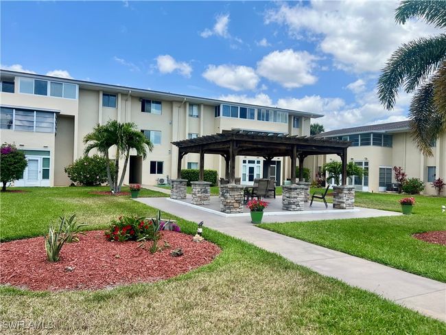 Surrounding community featuring a pergola, a yard, and a patio | Image 24