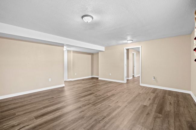 5506 145 Th St, Home with 5 bedrooms, 4 bathrooms and null parking in Urbandale IA | Image 19