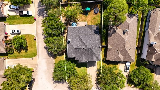 A bird’s-eye view directly above the home, showcasing the spacious corner lot. This perspective highlights the property’s generous size and prime location within the Windrose community, offering plenty of room for both outdoor living and privacy. | Image 37