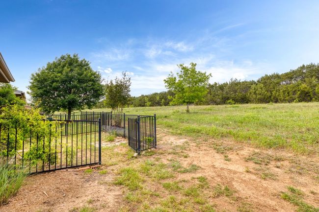 View of yard featuring fence and a rural view | Image 30