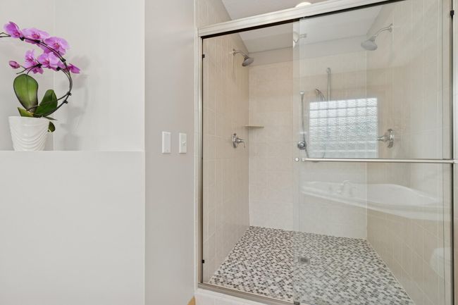 Upper Level Primary Bathroom Custom Tile Walk-in Shower | Image 28