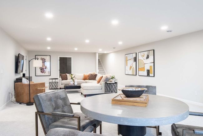 Another view of this spacious finished lower level. Photos are from previously built home; features and options will vary. | Image 25