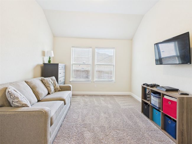 Sitting room featuring baseboards, vaulted ceiling, and carpet flooring | Image 6