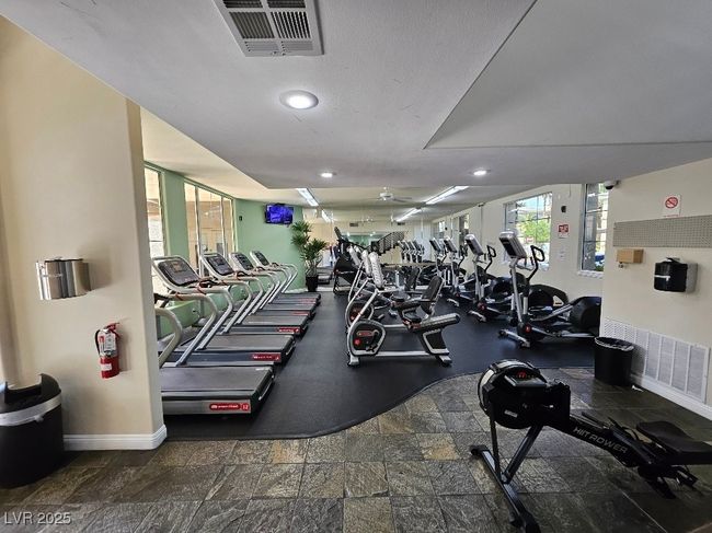 Exercise room with baseboards, visible vents, and recessed lighting | Image 14