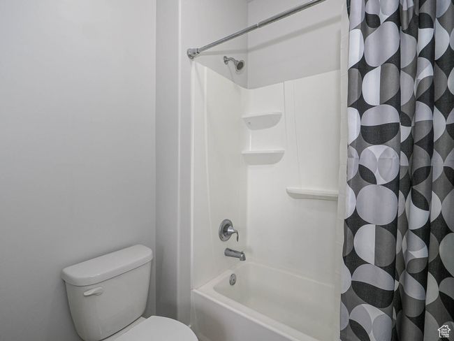 Full bathroom with shower / tub combo and toilet | Image 23