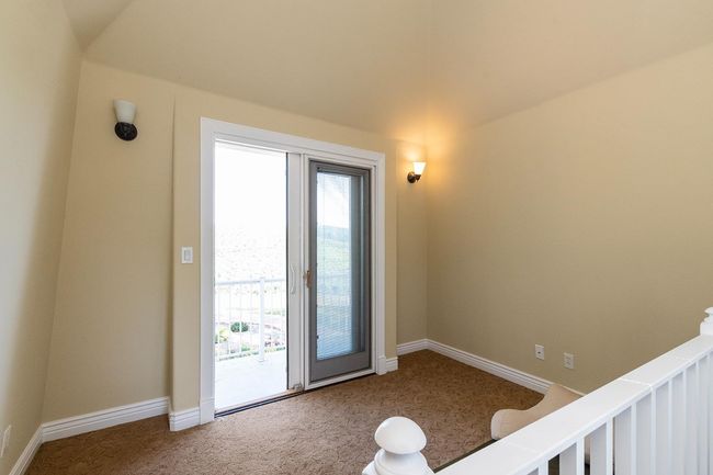Hidden room up the pull down stairs, slider to balcony in front of home. | Image 37