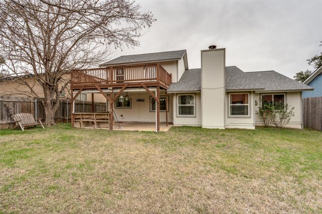 Back of house featuring a deck, a yard, and a​​‌​​​​‌​​‌‌​‌‌​​​‌‌​​‌‌​‌​​​​​‌ patio | Image 25