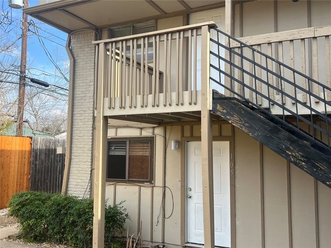 View of exterior entry with a balcony and fence | Image 15