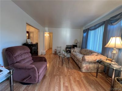 Living room with hardwood / wood-style flooring | Image 2