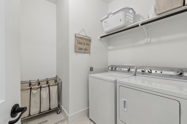 Laundry room also has a wall plug (not shown) for charging | Image 22