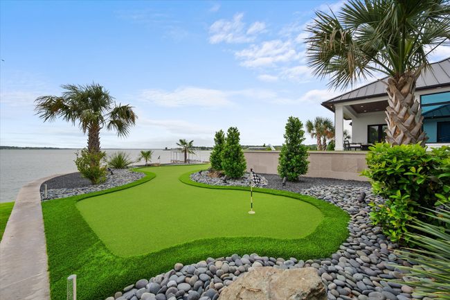 View of community featuring a water view and fence | Image 28