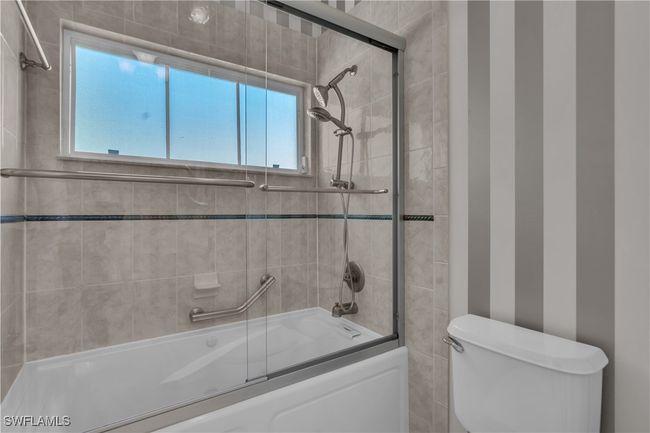 Full bath with shower / bath combination with glass door and toilet | Image 19