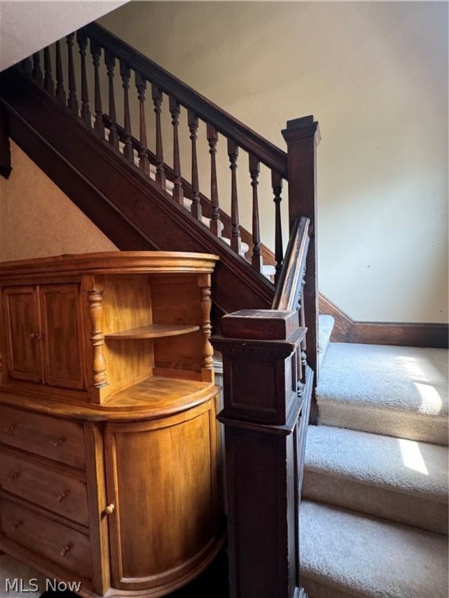 Stairs featuring carpet floors | Image 19