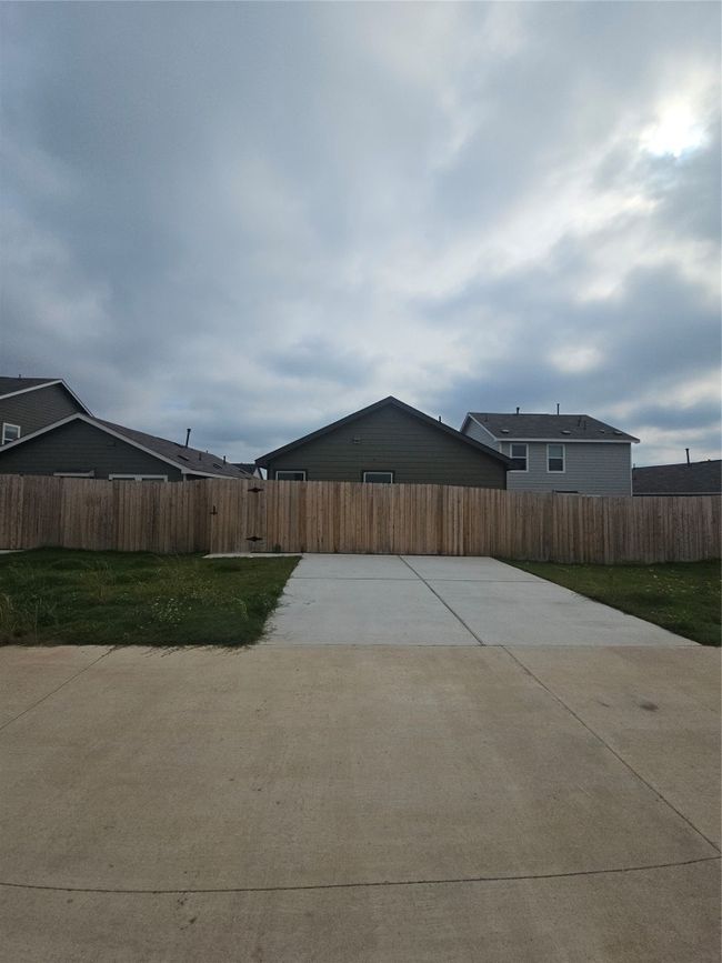 View of patio featuring concrete driveway | Image 28