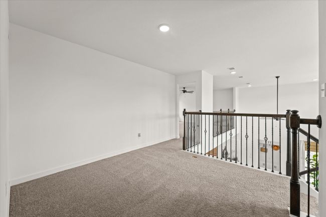 Carpeted spare room featuring recessed lighting and ceiling fan | Image 24